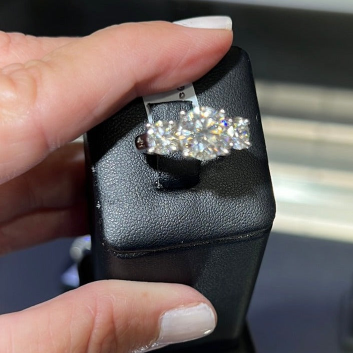 What should be a gorgeous diamond ring on a black stand, but it's completely out of focus.